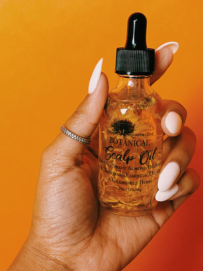 The botanical scalp oil made with calendula, rice bran oil, neem oil, rosemary oil. This botanical oil is for hair and scalp 